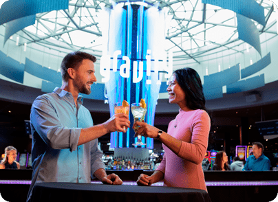 Couple cheers outside the gravity bar located in the center of North Star Mohican Casino Resort.