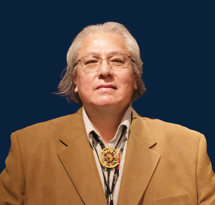 Executive Host Mark Davids with blue background